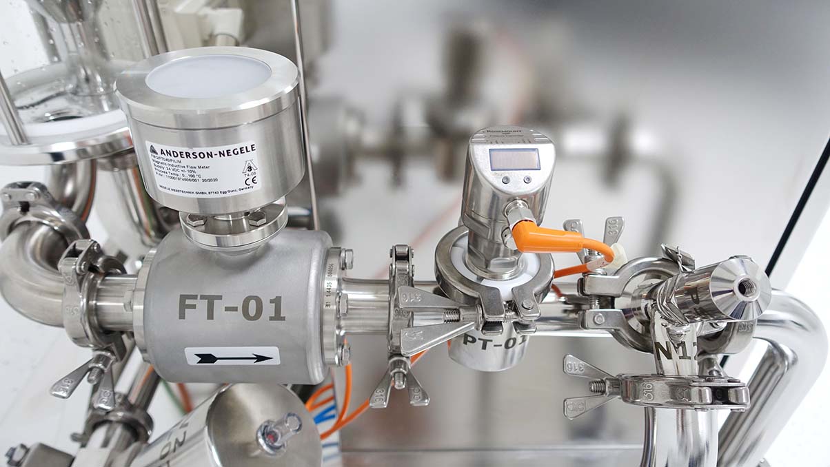 Flow meter and pressure sensor on chromatography skid