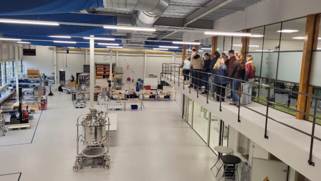 Students in our production facility overlooking the area
